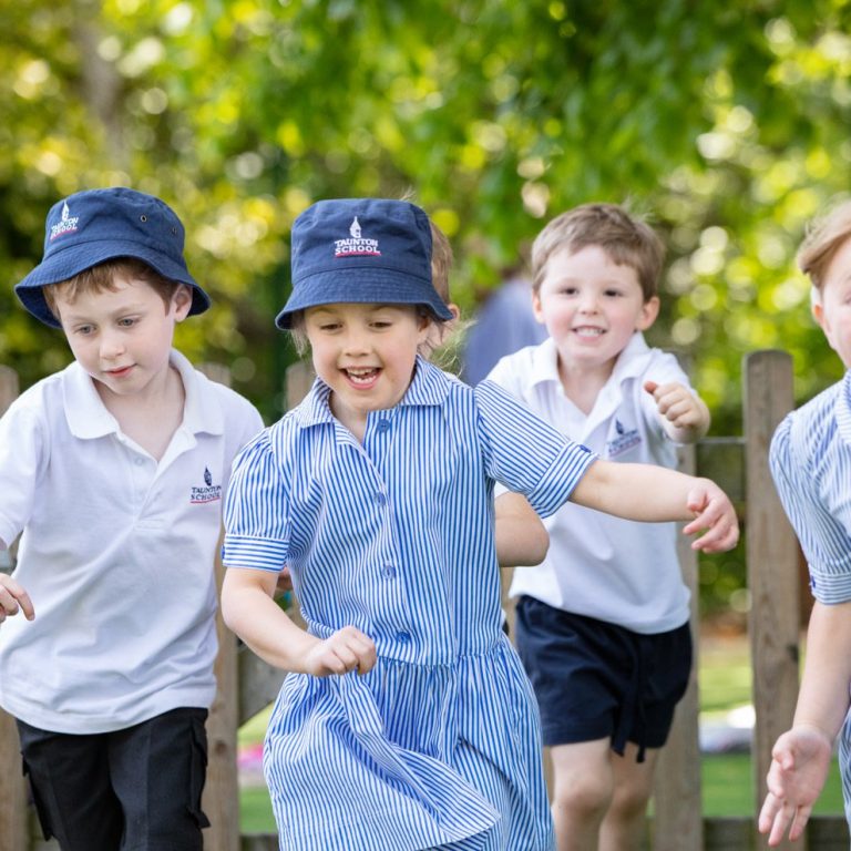 Taunton School Pre-Prep Students Chasing Each Other