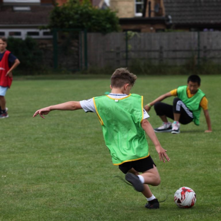 Taunton School Prep Boy Kicking Football