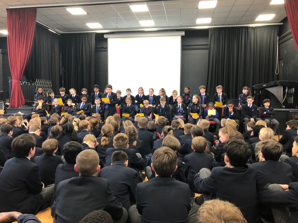 a class assembly at a private school in Surrey