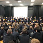 a class assembly at a private school in Surrey