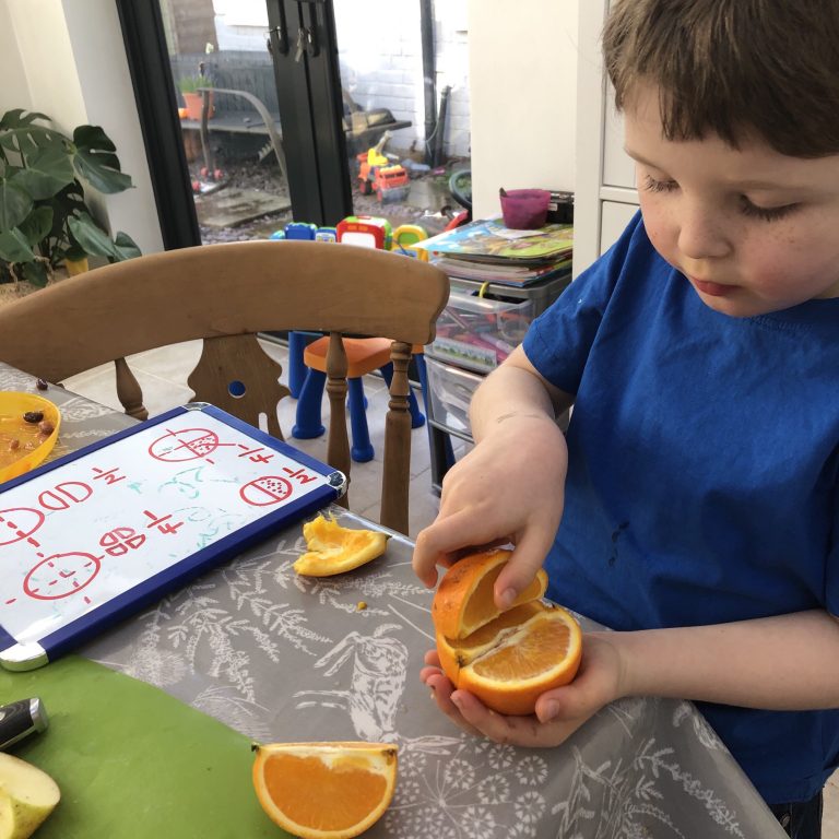 Taunton School Pre-Prep Student With Oranges