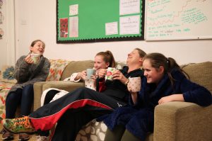 Taunton School Prep Boarding Girls Drinking on Sofa