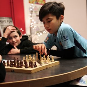 boys playing chess