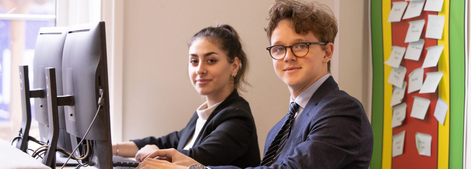 two students sitting at computers