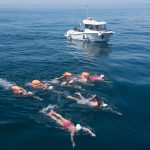 teenagers swimming in the english channel