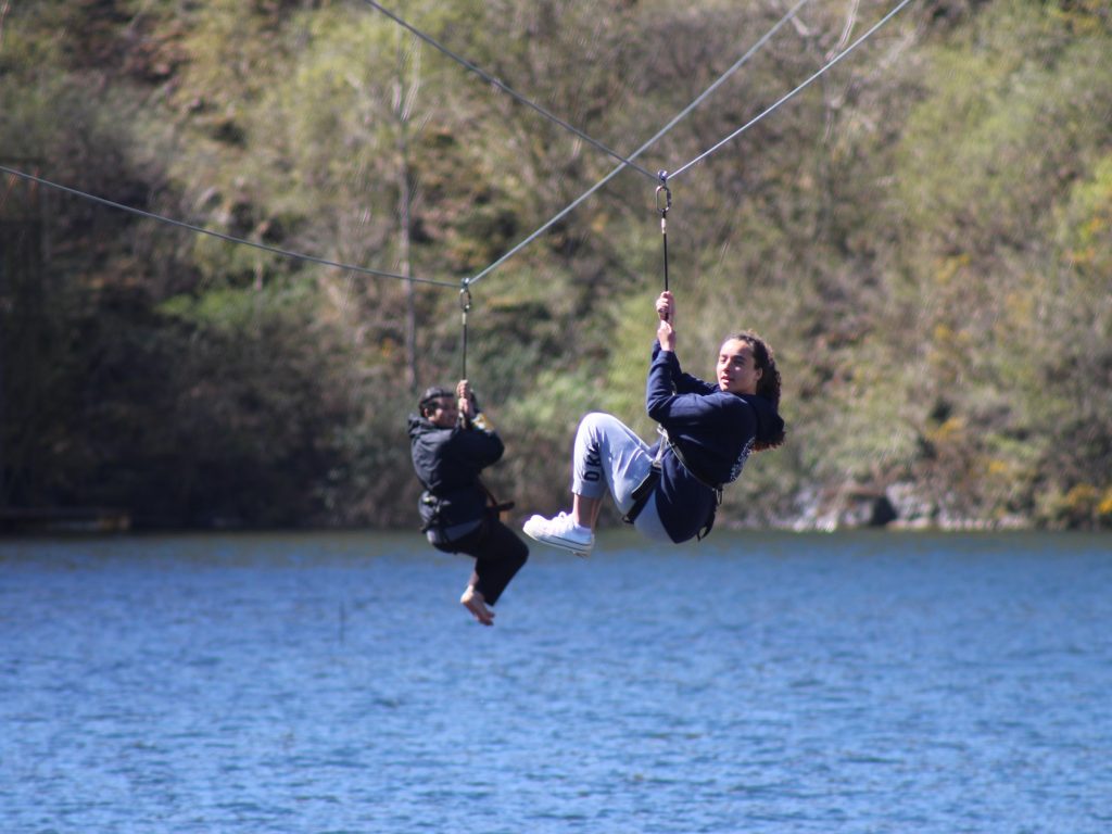 Student using a trapeze