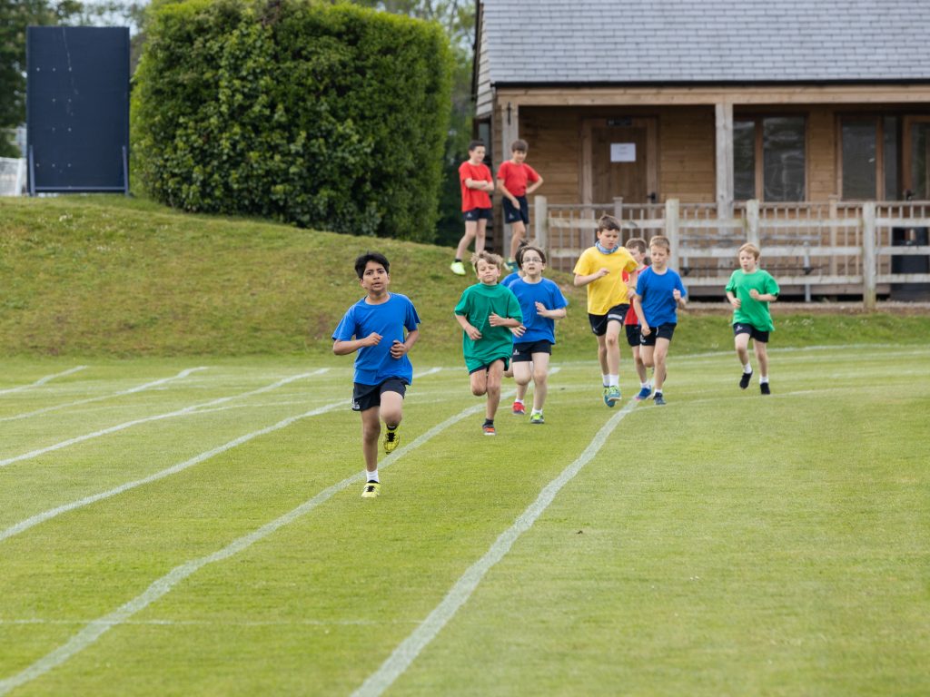 A group of Prep school students running.
