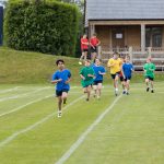A group of Prep school students running.