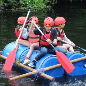students on a raft