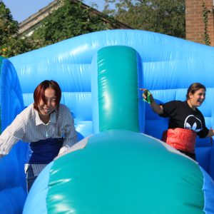 students on inflatables